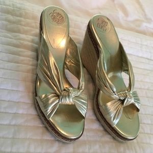 Women’s BCBG gold wedge size 7